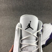 Close-up of the white tongue with a black Jumpman logo and laces