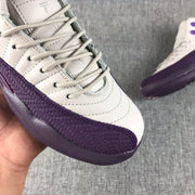 Close-up of the laces and textured purple side overlay