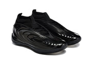 Pair of black sneakers in a three-quarter side view