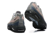 Heel and outsole views showing Nike Air Max 95 details and black soles