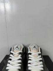 Top view of the pair showing white laces, padded collars and tongue labels with Jumpman and AIR markings.