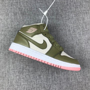 Angled side view showing the olive panels, white quarter section, and pink outsole.