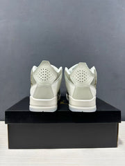 Rear view of the sneakers showing heel panels and perforated collar details.