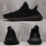 Multi-view collage showing the black sneaker from the side, front, and rear.