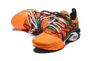 Pair of orange and black Nike Air Max Plus sneakers viewed from the front and side.