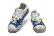 Pair of blue and light grey low-top lace-up sneakers with contrasting laces.