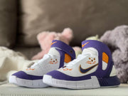 Pair of purple, white, and orange high-top sneakers shown at a three-quarter angle.