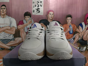 Front view showing the textured white forefoot, white laces, dark collar lining, and Jordan-style tongue branding.