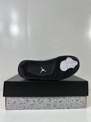 Bottom view of the black outsole with white traction sections and a Jumpman mark.