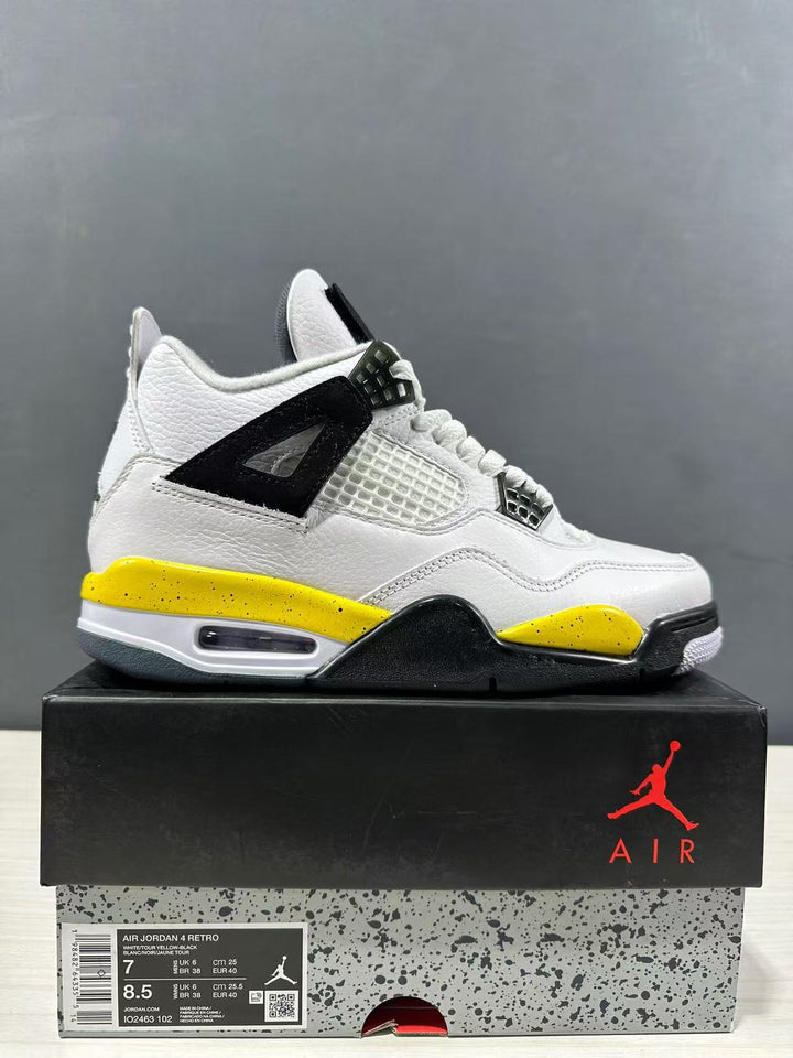 Side view of a white, yellow, and black Jordan Air Jordan 4 sneaker displayed on a shoebox; the box label shows a photographed sample in EU 40.