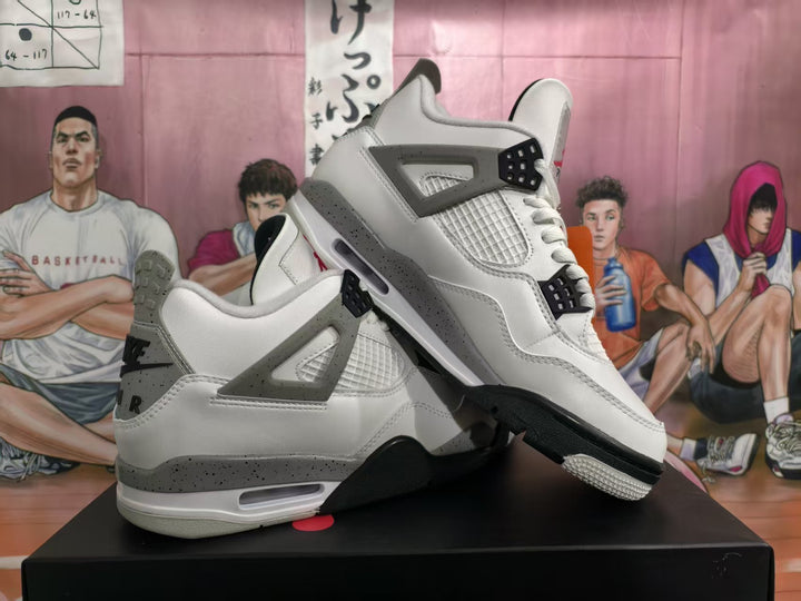 Pair of white, black, and speckled grey high-top basketball sneakers shown from a three-quarter angle.