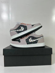 Stacked view of the sneaker pair showing both side profiles and patterned panels.