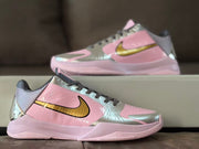 Side view of one shoe with the second shoe blurred in the background.