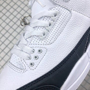 Close-up of the perforated white lace panel and black side overlay.