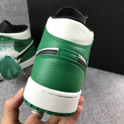 Rear close-up showing the green heel overlay, white collar, and white midsole.