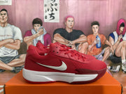 Side view of a red Nike sneaker with white side branding, a white midsole, and a textured red outsole.
