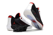White, black and red Luka.77 sneakers shown from the rear and outsole angles.