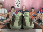 Top view of the olive green Nike sneakers showing textured tongues, laces and dark brown upper detailing.