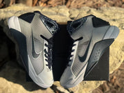Top-down view of the pair showing the patterned collars, dark Swooshes, and white toe sections.
