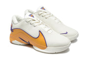 Angled view of the pair showing white perforated uppers, gold-orange side panels, purple trim, and lace-up fronts.