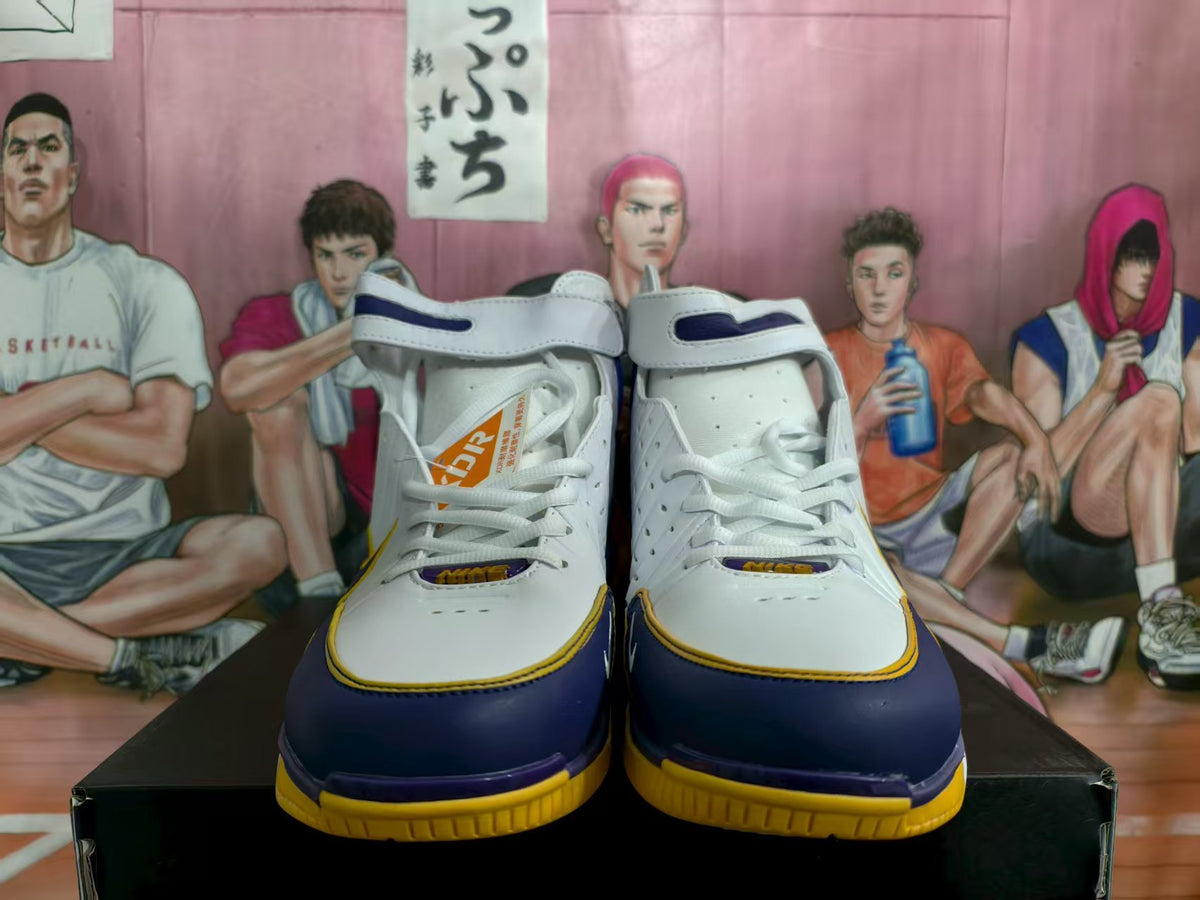 Front view of white high-top Nike basketball sneakers with purple and yellow accents.