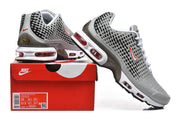 Grey Nike Air Max Plus VIII sneakers displayed on a Nike shoebox; the box label shows sample size 10 US Men and 11.5 US Women.