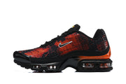 Side view of a black and red-orange Nike sneaker with visible cushioning units.