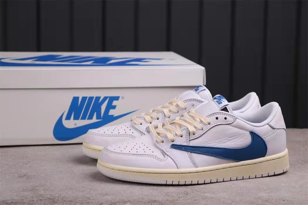 Pair of white and blue low-top sneakers displayed with a branded shoe box.