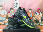 Nike Kobe basketball shoes in black with purple and volt-green accents, shown at an angle.
