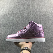 Side profile of one pink rose and burgundy high-top sneaker.