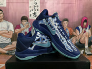 Angled view of the pair highlighting the side swoosh, skeletal upper graphic, padded collar, and outsole.