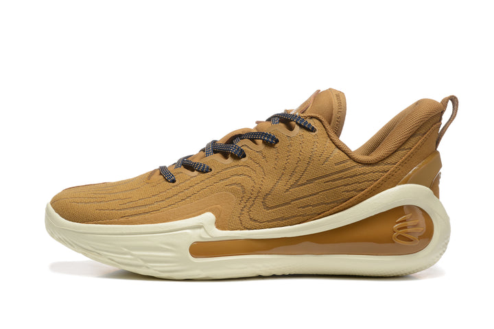 Side view of brown 901-11 sneakers with dark laces, cream outsole, and translucent brown heel detail.