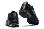Rear and outsole views of black Nike Air Max Plus TN sneakers with blue accents.