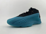 Side view of a black and blue mid-top basketball shoe