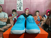 Front view of blue Nike basketball shoes with a white ridged outsole
