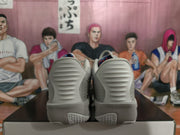 Rear view of the gray Nike KD sneakers showing ribbed heel panels, padded collars, and patterned outsole sections.