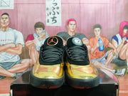 Front view of black and metallic-gold Jordan shoes with patterned laces