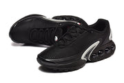 Pair of black Nike sneakers in angled side views