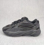 Side profile highlighting the layered panels and dark sculpted midsole.