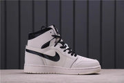 Side profile of the Summit White high-top sneaker with a black Swoosh.