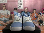 Front view of Carolina blue and white Nike basketball sneakers with white laces and a basketball-style signature logo on the tongues.