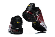 Rear and underside views of Nike Air Max Plus sneakers showing black heels and patterned outsoles.