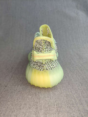 Rear view showing the padded heel pull tab, collar, and textured sole.