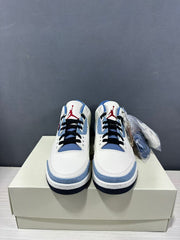 Front view of the pair showing the blue tongues and collars, black laces, and red tongue logos.