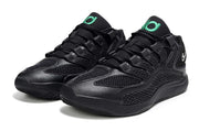 Pair of black Nike KD 18 shoes with green tongue details