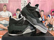 Angled view of the pair highlighting the layered upper, white outsole and speckled black midsole.