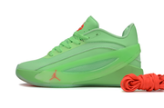 Fluorescent green sneaker shown in side profile with a translucent-looking side panel and coral logo.