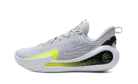 Side view of gray basketball shoes with white and bright green accents and a sculpted sole