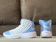 Side and rear view of the shoe showing the padded collar, side swoosh, and outsole details.