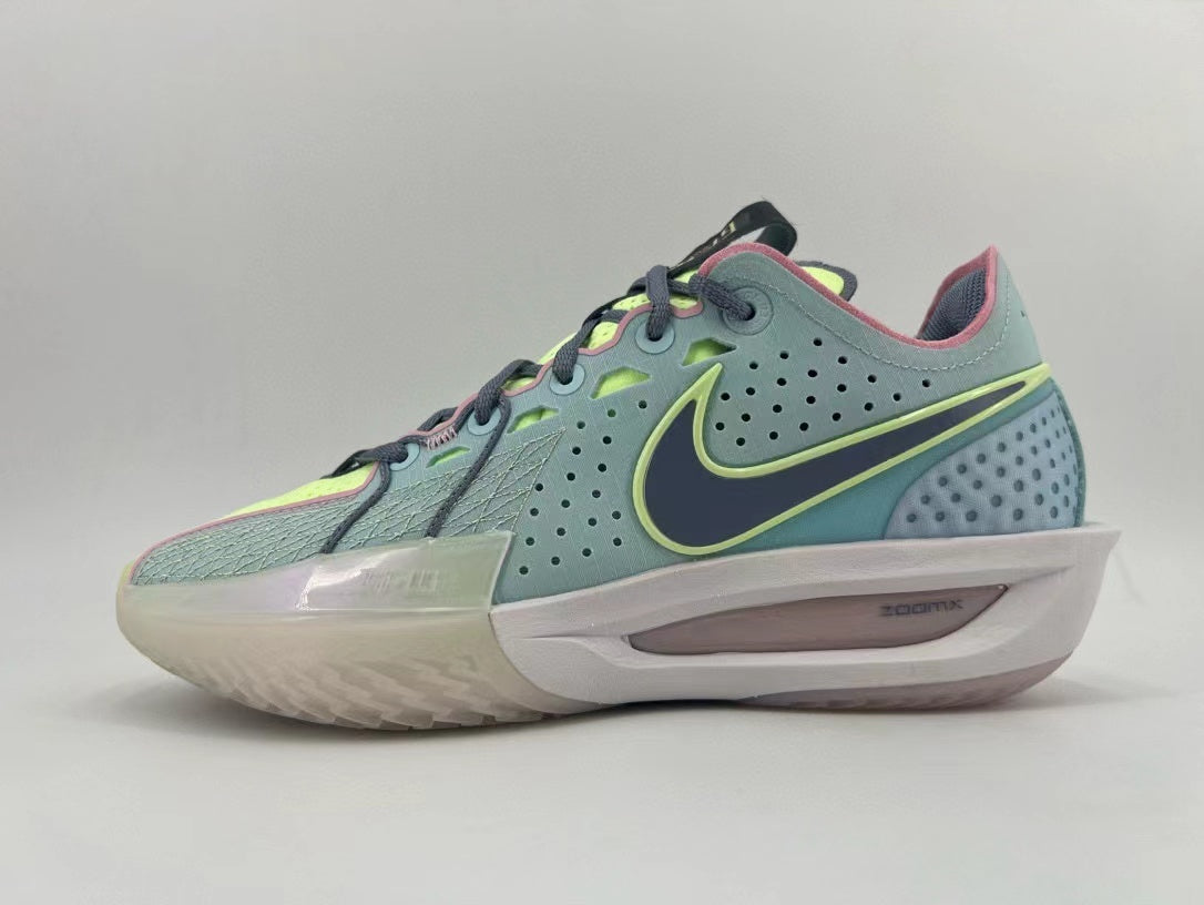 Side view of a blue-green Nike Sabrina 2 basketball shoe with a dark Swoosh outlined in yellow-green and Zoom Air branding on the midsole.